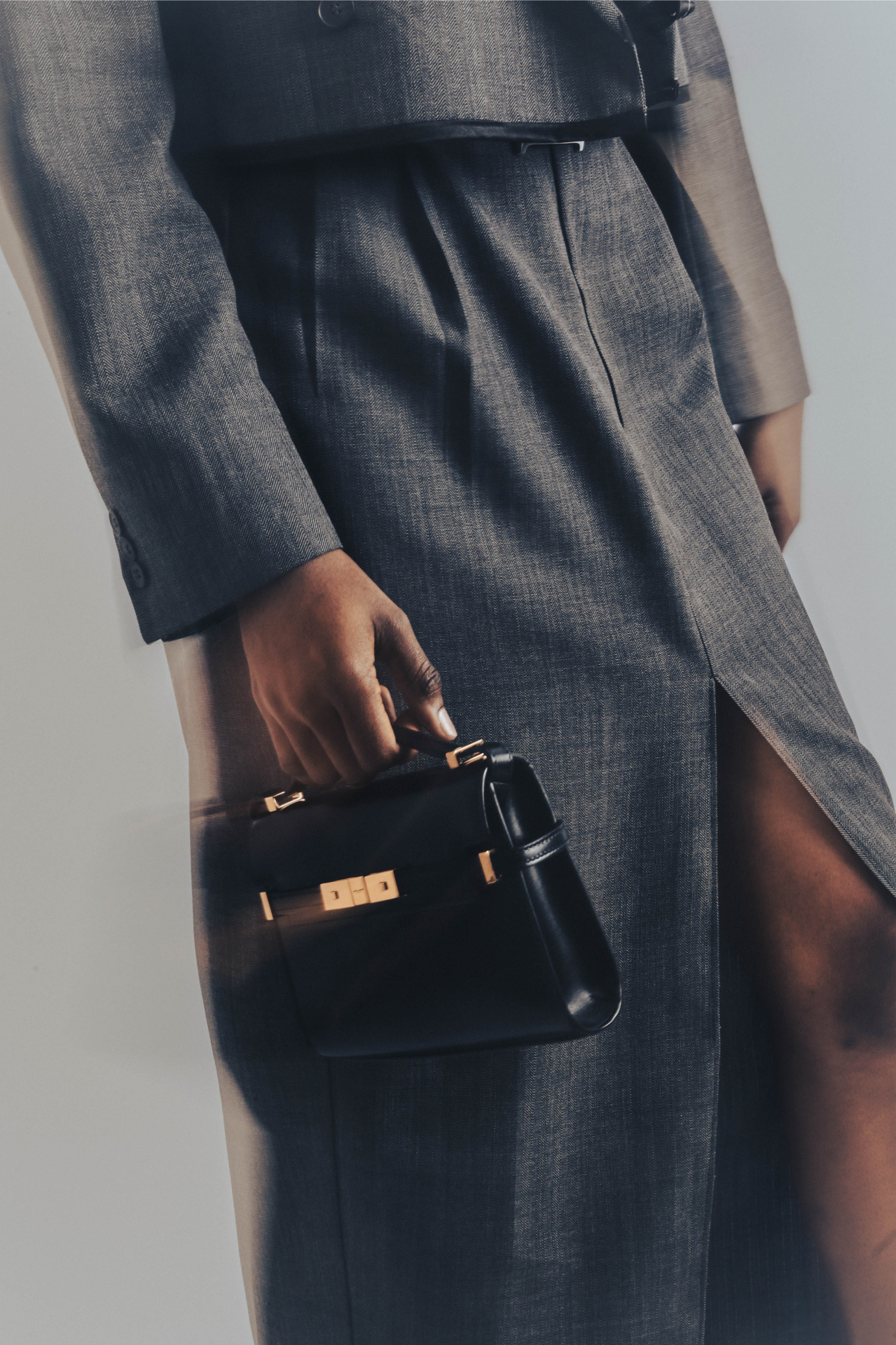 Structured mini bag with tailored skirt